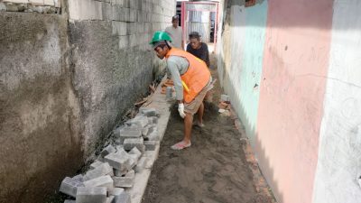 Dihantam Rob Pavingisasi Gang Caracas Tetap Berjalan