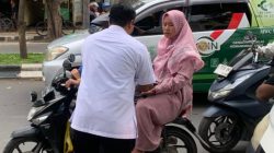 SPPG Dukuhwaru 1 Kabunan Bagikan Nasi Bungkus ke Pengguna Jalan